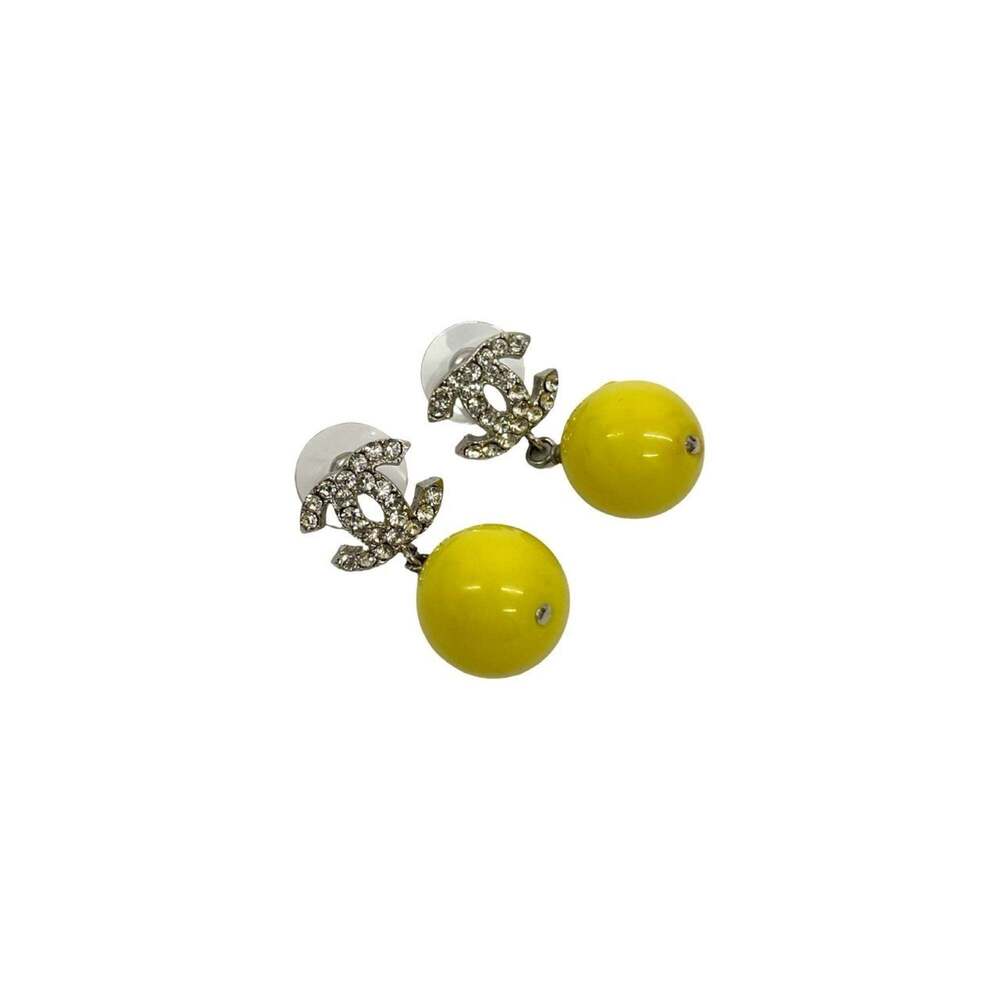 CHANEL Yellow Logo Earrings - Picture 5 of 6